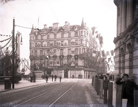 A Union Street building dressed with flags and garlands for the 1906 Royal Visit